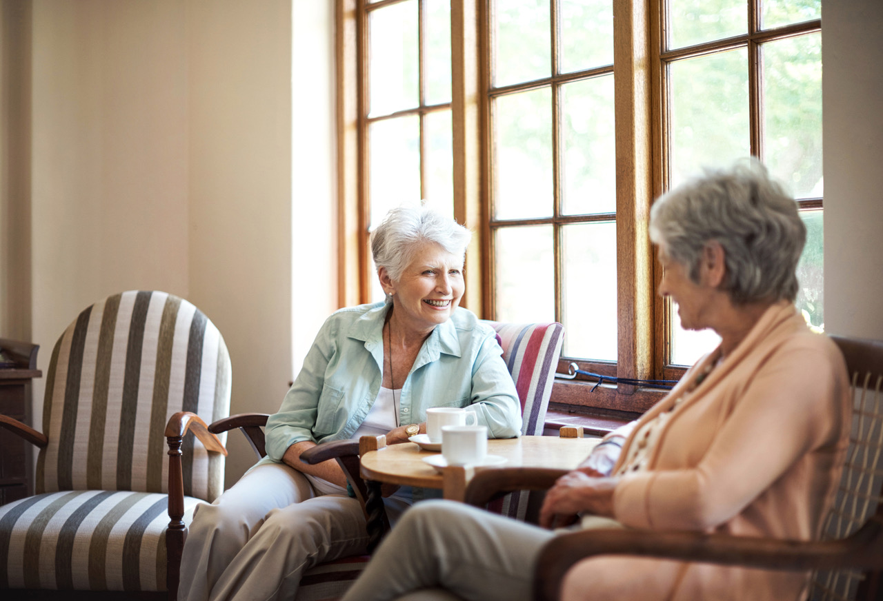 Two senior women talking about Central Alberta