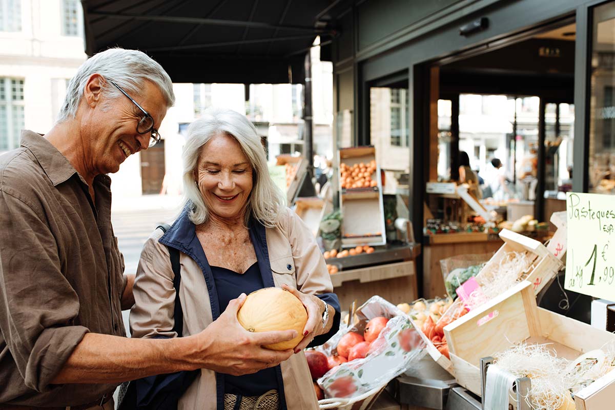 Older couple enjoying walkable community 